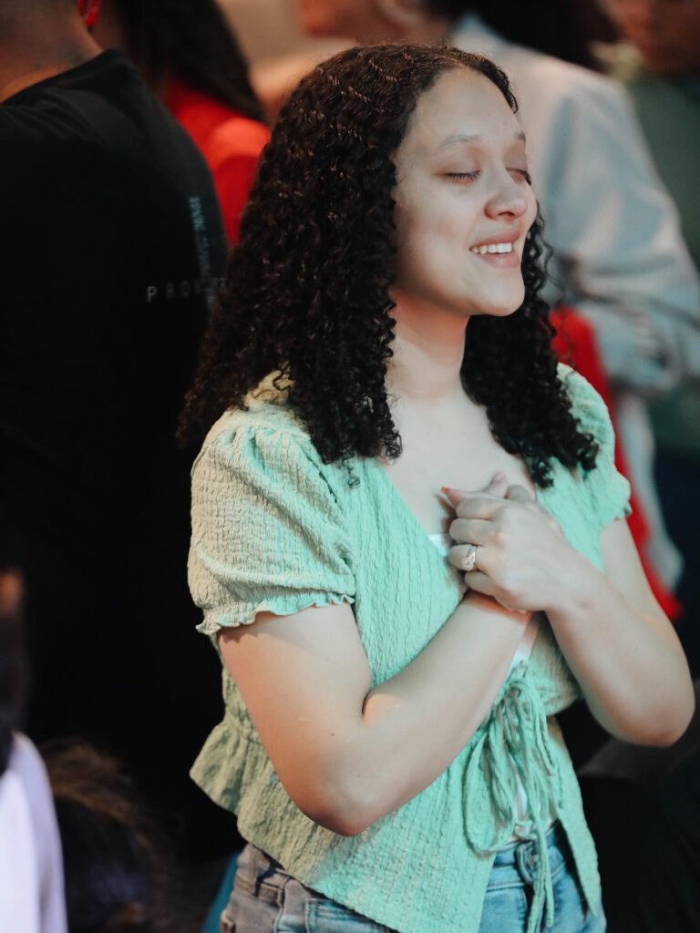 Lady enjoying Gods presence.