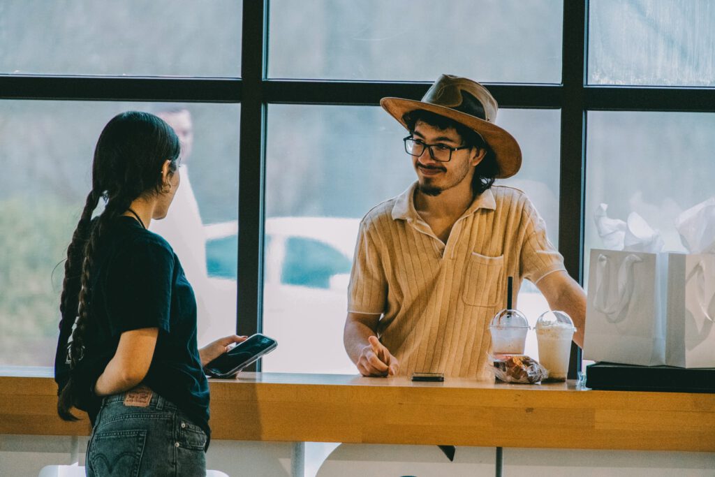 Two youths speaking.